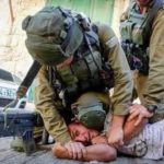 knee on neck Israeli police